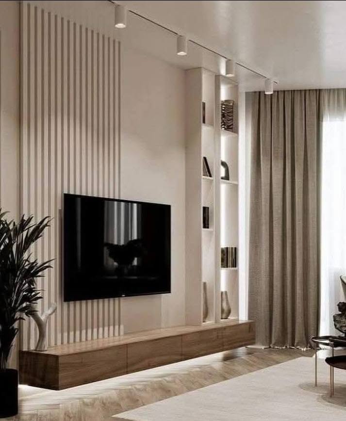 Minimalist media wall with fluted panelling and timber console