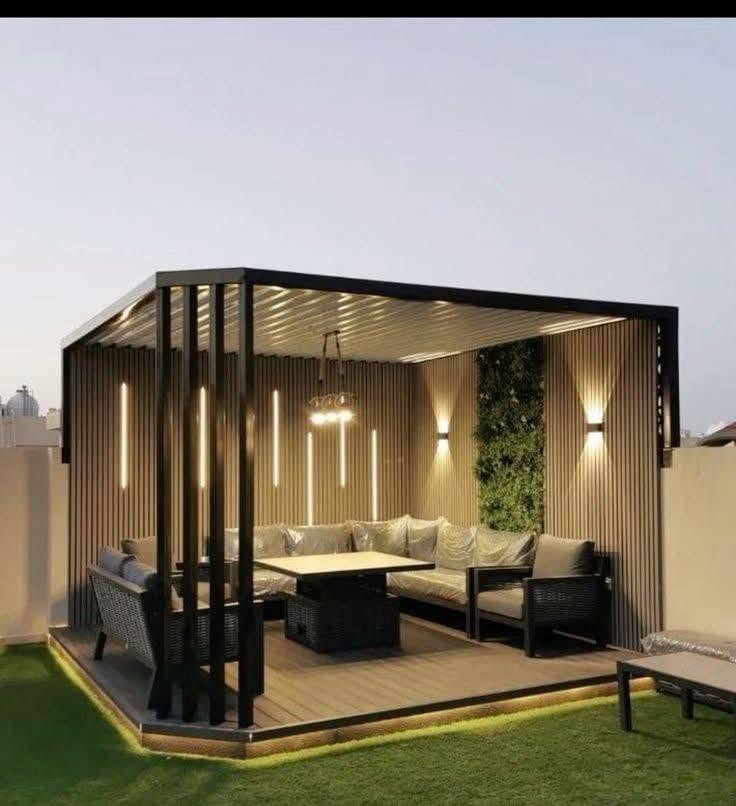 Pergola terrace lounge with timber cladding and vertical lights