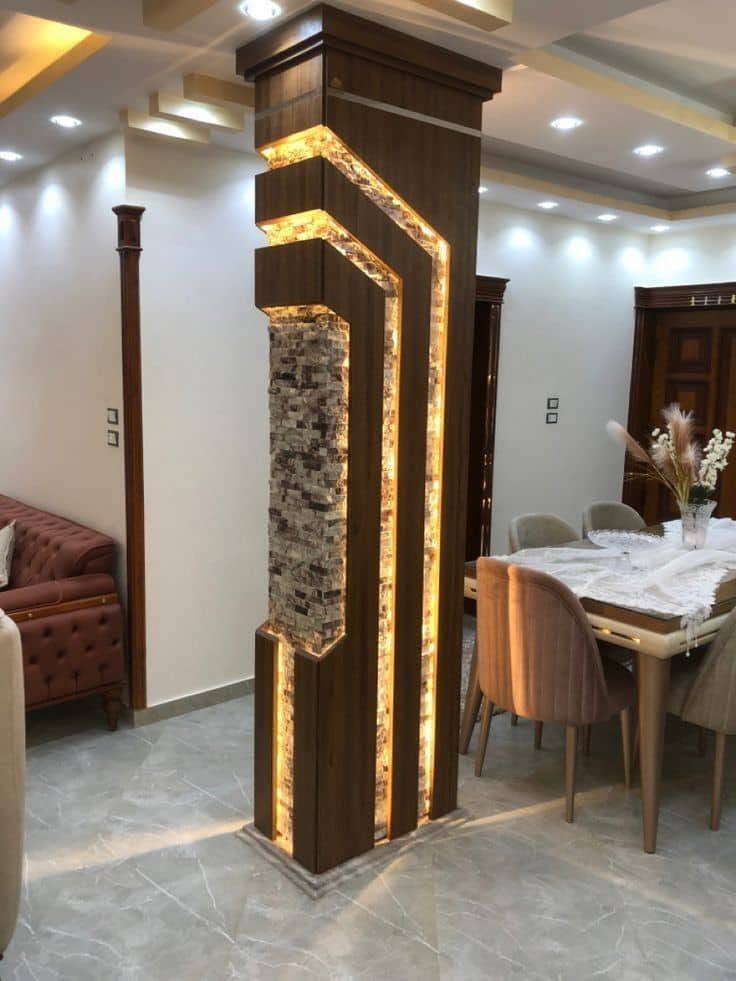 Feature column with natural stone cladding and warm LED lighting