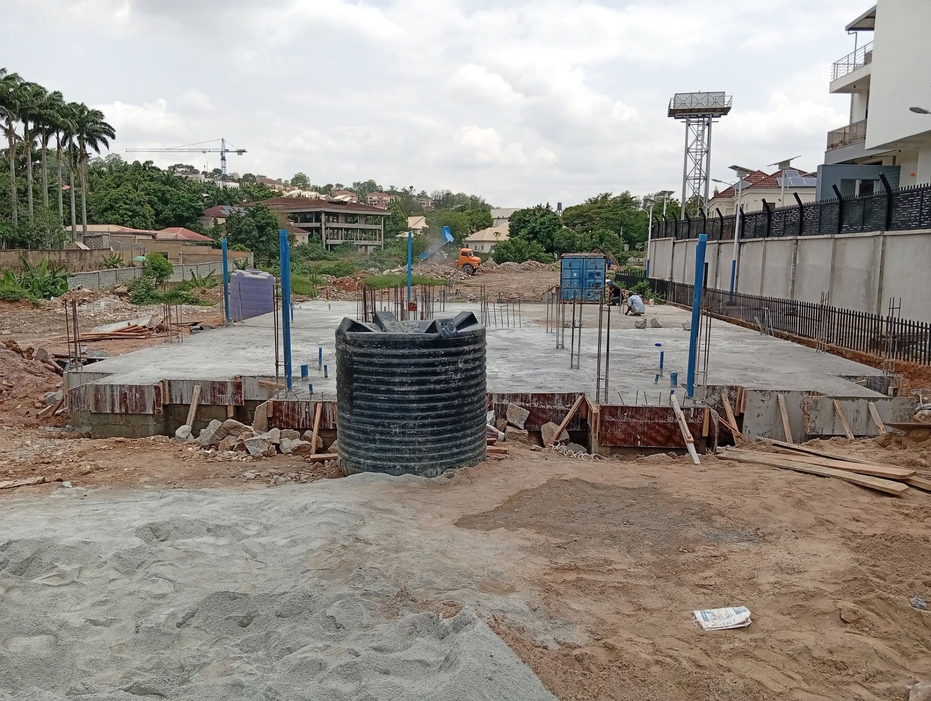 Concrete foundation slab at an Amocity construction site in Abuja